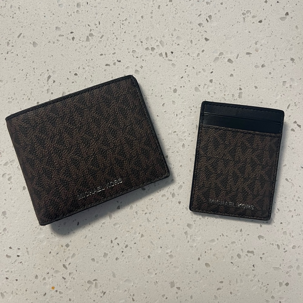 Two mens Michael kors wallet